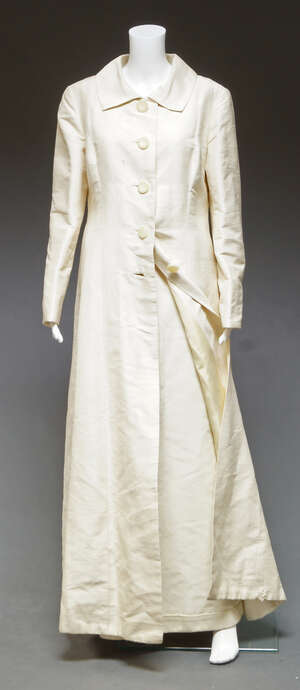 
	
		Worth, a cream silk full length evening coat, by Worth Boutique, Paris, together with a...