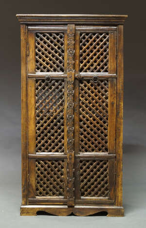 
	
		A 17th Century style food cupboard, 20th Century, the moulded cornice above two pierced...