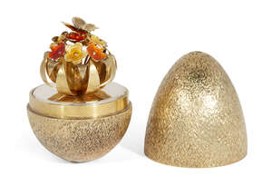 
	
		A limited edition silver gilt surprise egg by Stuart Devlin, London, c.1981, opening to...