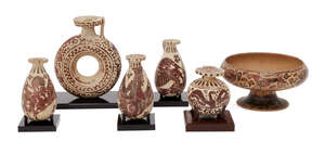 A group of reproduction Corinthian style pottery vessels, including a stemmed dish, 8cm high, 15cm diam; a ring askos, 14cm high; a spherical bodied aryballos,