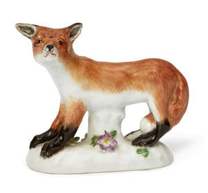 
	
		A Meissen porcelain model of a fox, circa 1955, blue crossed swords mark and incised...