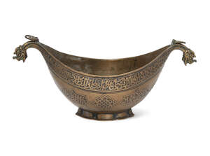 
	
		A bronze Kashkul Iran, 19th century or later, of boat shaped form with dragon-head...