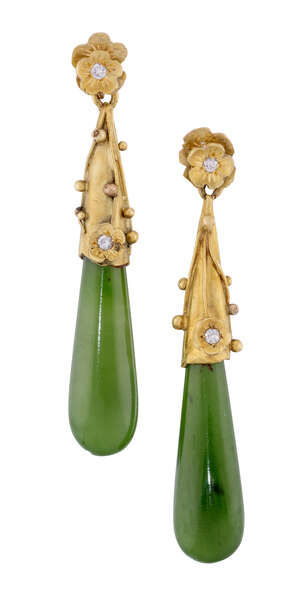 
	
		A pair of nephrite jade and diamond ear pendants, the tapered nephrite jade drops to...