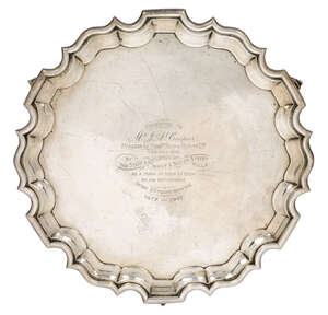 
	
		A presentation silver salver, Chester, c.1924, Barker Brothers, with shaped pie crust rim...