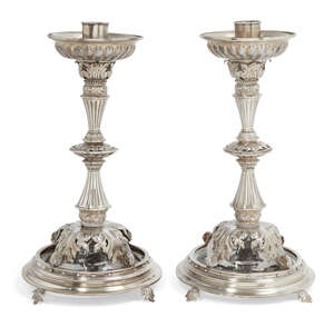 
	
		A pair of stylised French silver and glass candlesticks, maker's mark AC, of pierced...