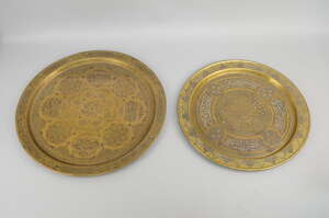 
	
		A Cairo ware brass charger, 20th century, inlaid to the centre with geometric patterns,...