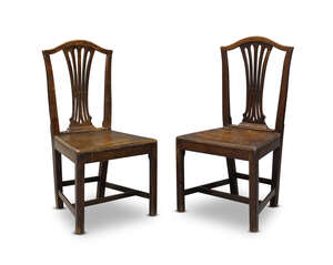 
	
		A pair of George III mahogany dining chairs, the serpentine top rails above pierced...