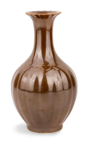 
	
		A Chinese lobed monochrome vase, Republic period, the pear-shaped vase evenly lobed to...