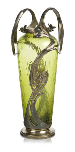 Art Nouveau, a green glass vase with sinuous plated metal mounts 
		c.1900, unsigned, probably Bohemian/Austrian
		The textured green glass vase mounted in s