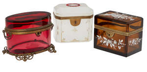 
	
		A Continental amber glass casket, late 19th century, with canted corners, overall...