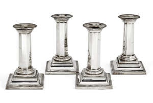 
	
		A matched set of four Victorian silver candlesticks, Sheffield, c.1887 and 1896, James...