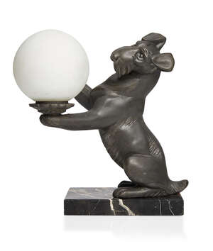 
	
		A French Art Deco metal table light in the manner of Irénée Rochard 
		Terrier with ball