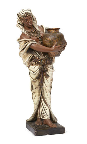 
	
		An Austrian painted terracotta figure of an Egyptian girl, late 19th/early 20th century, 