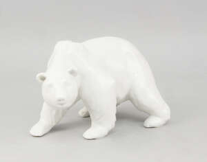 
	
		A KPM white porcelain model of a polar bear, 20th century, blue spectre mark, 25cm...