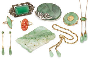 
	
		A Chinese jadeite plaque and a suite of jadeite jewellery, 20th century, the plaque...
