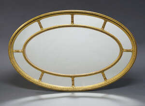 
	
		An Adam style oval gilt gesso marginal mirror, 20th century, with beaded and egg and dart...