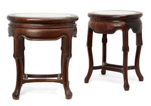 
	
		Two Chinese hongmu marble inset occasional tables, late Qing dynasty, of oval form with...