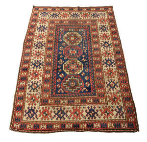 
	
		A Caucasian Kazak rug, last quarter 19th century, the central field with four geometric...