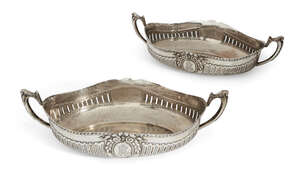 
	
		A pair of German silver twin handled dishes, Berlin, c.1900, Eugen Marcus, of shaped,...