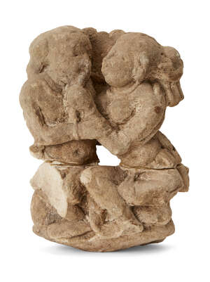 
	
		A carved sandstone fragment of a couple, possibly Satavahana, India, the woman playfully...