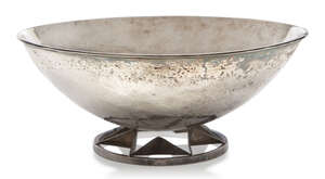 
	
		A hand made silver bowl in the Arts & Crafts style,
		Stamped RJN in a lozenge, London...