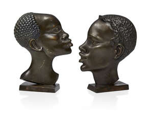 
	
		Two bronze heads in the manner of Hagenauer 
		Third quarter 20th Century, unsigned
		