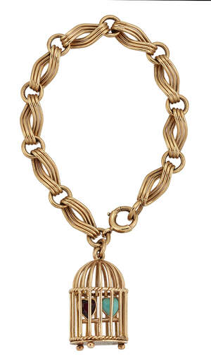 
	
		A 9ct gold bracelet with bird cage pendant, the flattened curb-link bracelet suspending a...