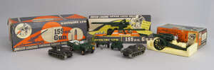 
	
		A Britain's Ltd. 155mm gun, 1.32 scale, in a cardboard box, together with a model of a...