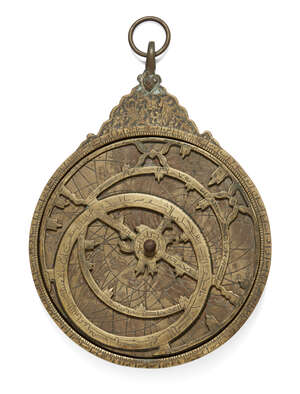 
	
		A Qajar decorative brass astrolabe, Iran, 19th century, of characteristic form with a...