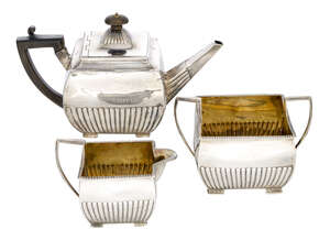 
	
		A George III three-piece silver tea set, London, c.1803 and 1804, possibly Thomas...
