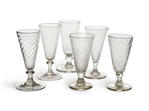 
	
		A harlequin set of six ale glasses, 18th century, all with wrythen decoration to inverted...