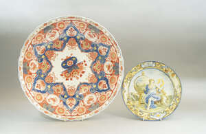 
	
		A Continental maiolica plate, 19th century, decorated to the centre with a female figure...