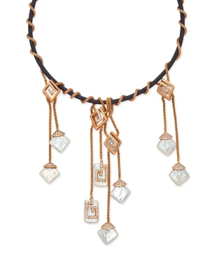 A freshwater cultured pearl and diamond necklace, designed as a rubber cord with wrapped...