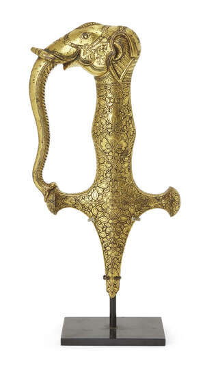 
	
		A Kutch finely chased gold sword hilt in the form of an elephant (talwar), India, late...