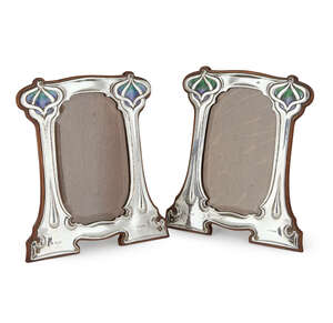 
	
		William Hutton & Sons, a pair of Art Nouveau silver and enamel photograph frames
		Mark...