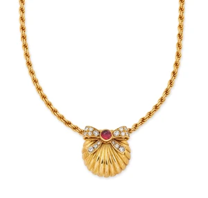 Kutchinsky. A ruby and diamond set pendant, the pendant designed as a scallop-shell motif pendant with cabochon ruby and brilliant-cut diamond set bow, to Prin