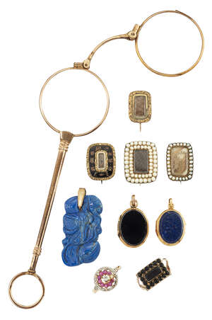 A group of jewellery, comprising: two Victorian gold oval hinged lockets, one mounted with lapis lazuli the other bloodstone; a mid-19th century black onyx rec