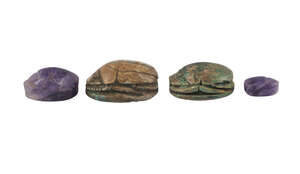 A collection of four Egyptian scarabs, some with inscriptions New Kingdom, 18th-19th Dynasty, 1540-1186 BC, 0.8-2.7 cm long (4)
		 
		Provenance: Collection
