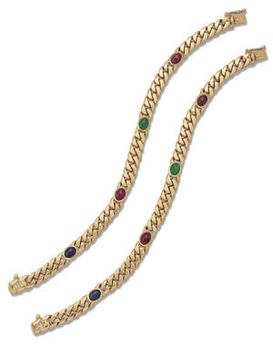 
	
		A pair of  gold and gem-set bracelets, of curb link design accented with cabochon rubies,...