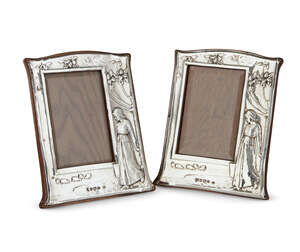 
	
		Charles S Green, a pair of Edwardian silver photograph frames
		Mark of Charles S Green...