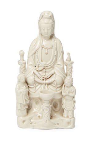 
	
		A Chinese Dehua porcelain figure group, 17th century, depicting Guanyin seated before an...