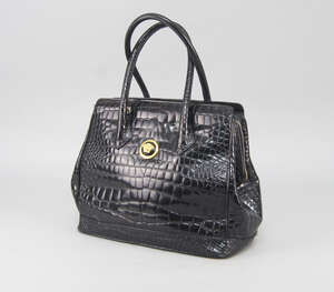 
	
		Gianni Versace Couture: A black crocodile effect pressed leather handbag, with twin...