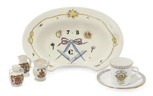 
	
		A reproduction Masonic shaving dish, 18th century style, of typical form, designed with...