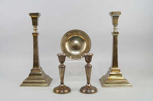 
	
		A pair of silver candlesticks, Birmingham c.1937, Britton, Gould & Co, the square...