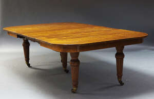 
	
		A late Victorian oak extending dining table, the rounded rectangular top with three...