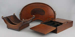 
	
		A George III mahogany cutlery box, with integral carrying handles, the two hinged lids...
