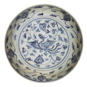 
	
		A Chinese porcelain 'phoenix' dish, 16th century, painted in underglaze blue with a...