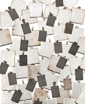 A group of pendants, each of rectangular form, with Arabic script, stamped 925, lengths from 3...