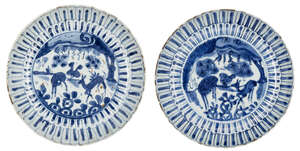 
	
		A pair of Chinese porcelain moulded saucer dishes, 17th century, painted in underglaze...