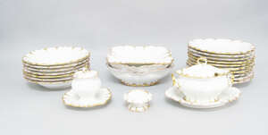 
	
		A Continental porcelain part dinner service, 20th century, decorated to the borders with...